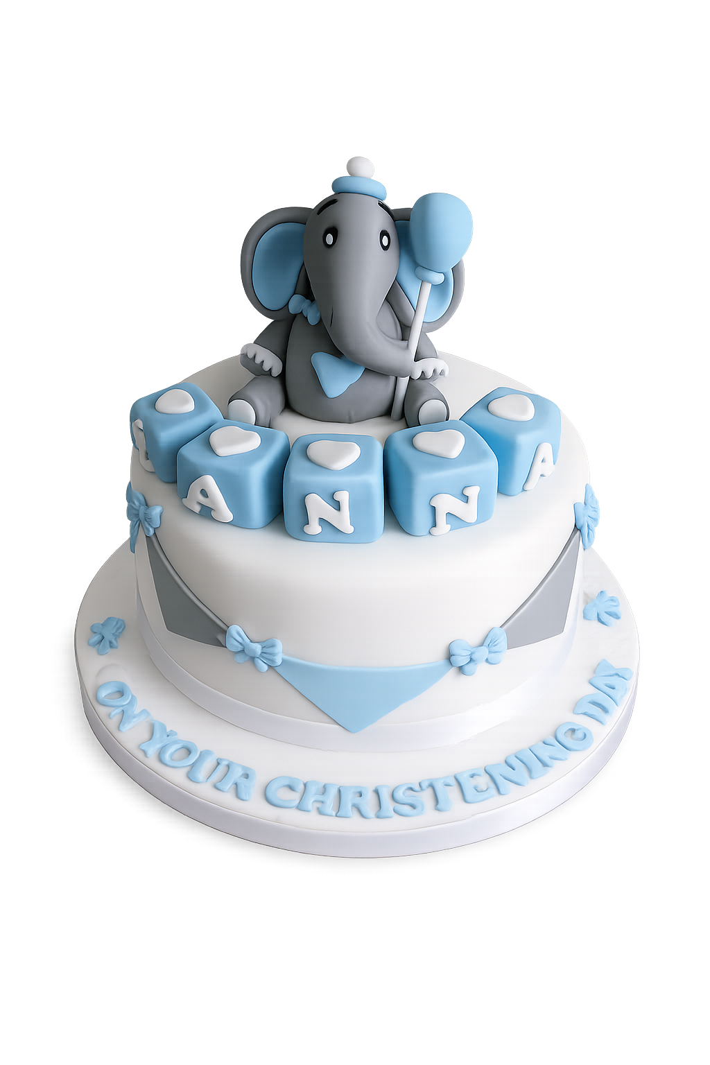 Christening cake with elephant topper and name blocks